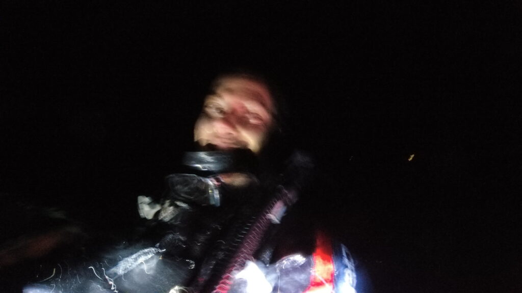 man smiling on the surface of the water