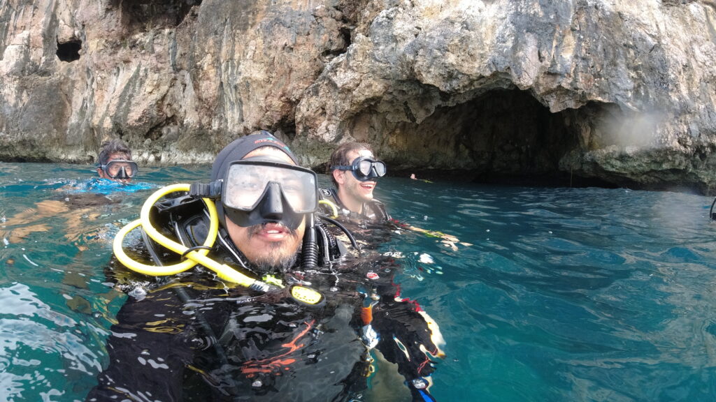 2 men about to SCUBA dive