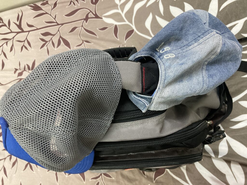 2 head caps on a bag.