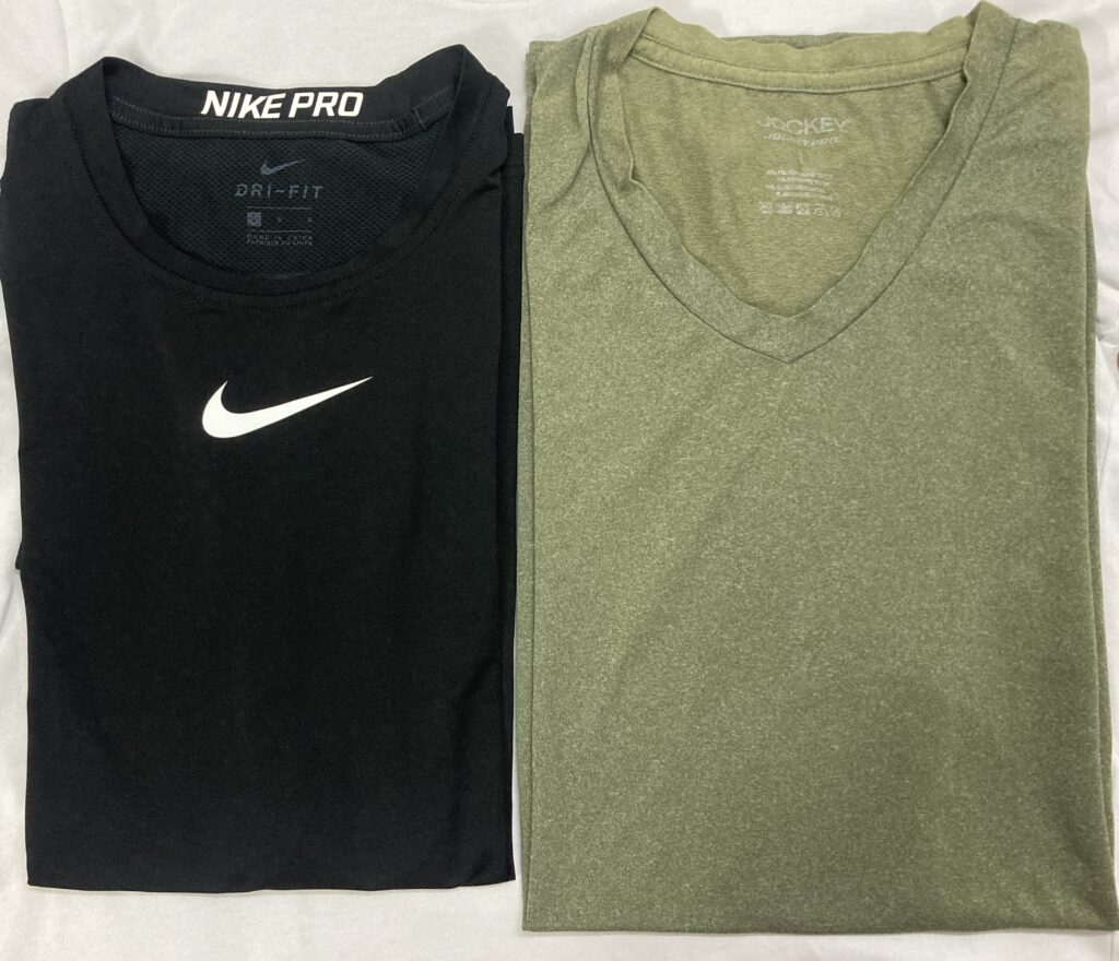 2 t-shirts side by side. One is color black and one is green.
