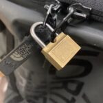 a padlock in a two zippers.