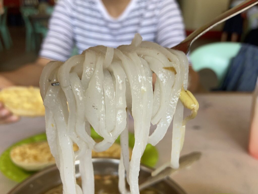 white rice noodle on a fork