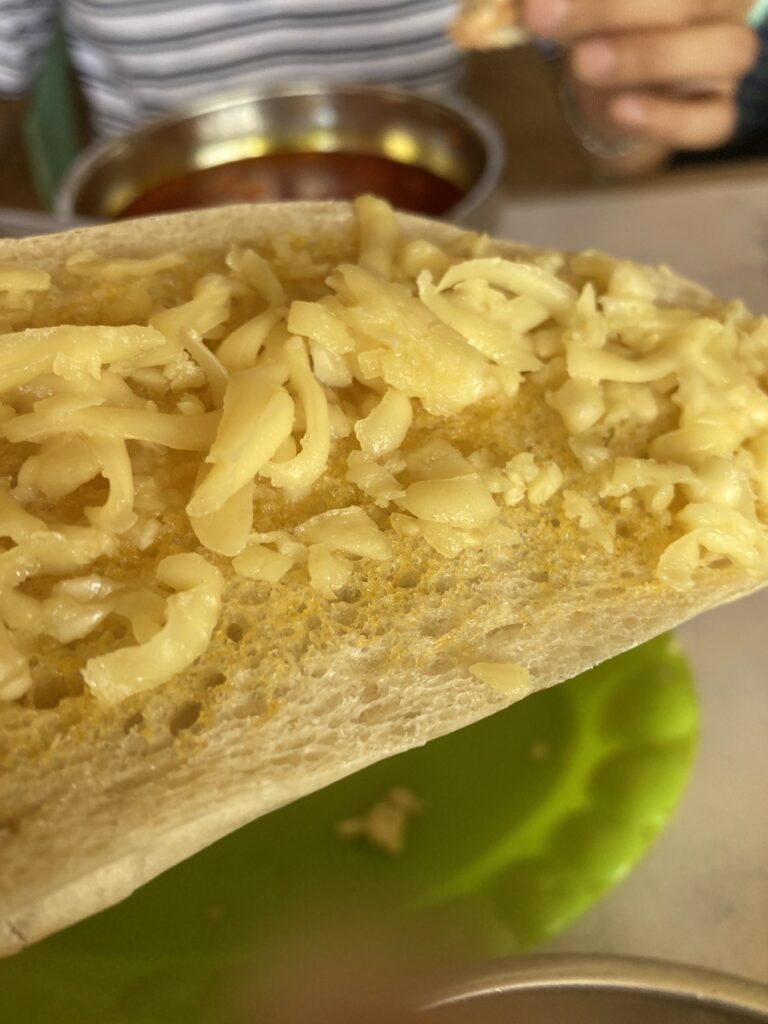 French bread with garlic and cheese on top