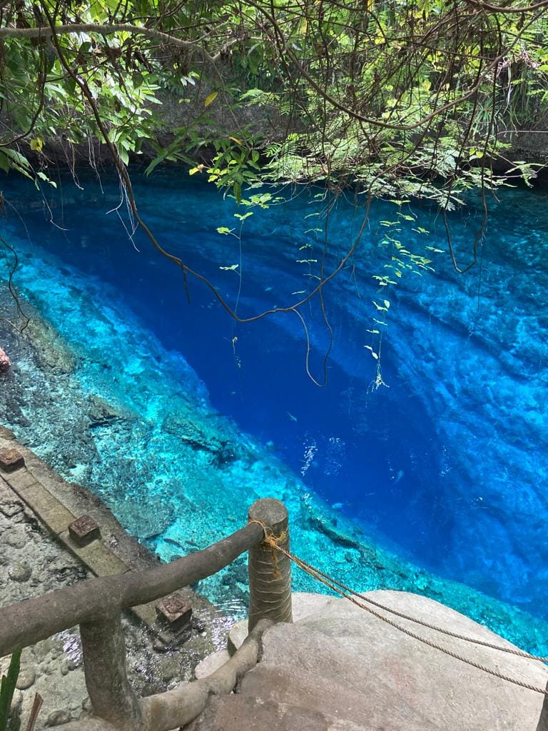 Super clear enchanted river taken from a cliff.